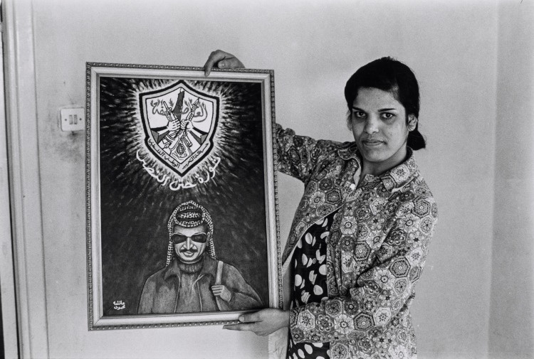 Woman Posing with Painting of Yasser Arafat, Palestine