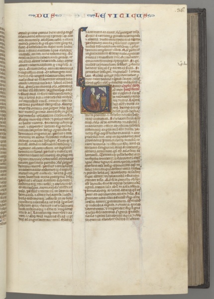 Fol. 36r, Leviticus, historiated initial V, Moses offering a sacrificial lamb on an altar