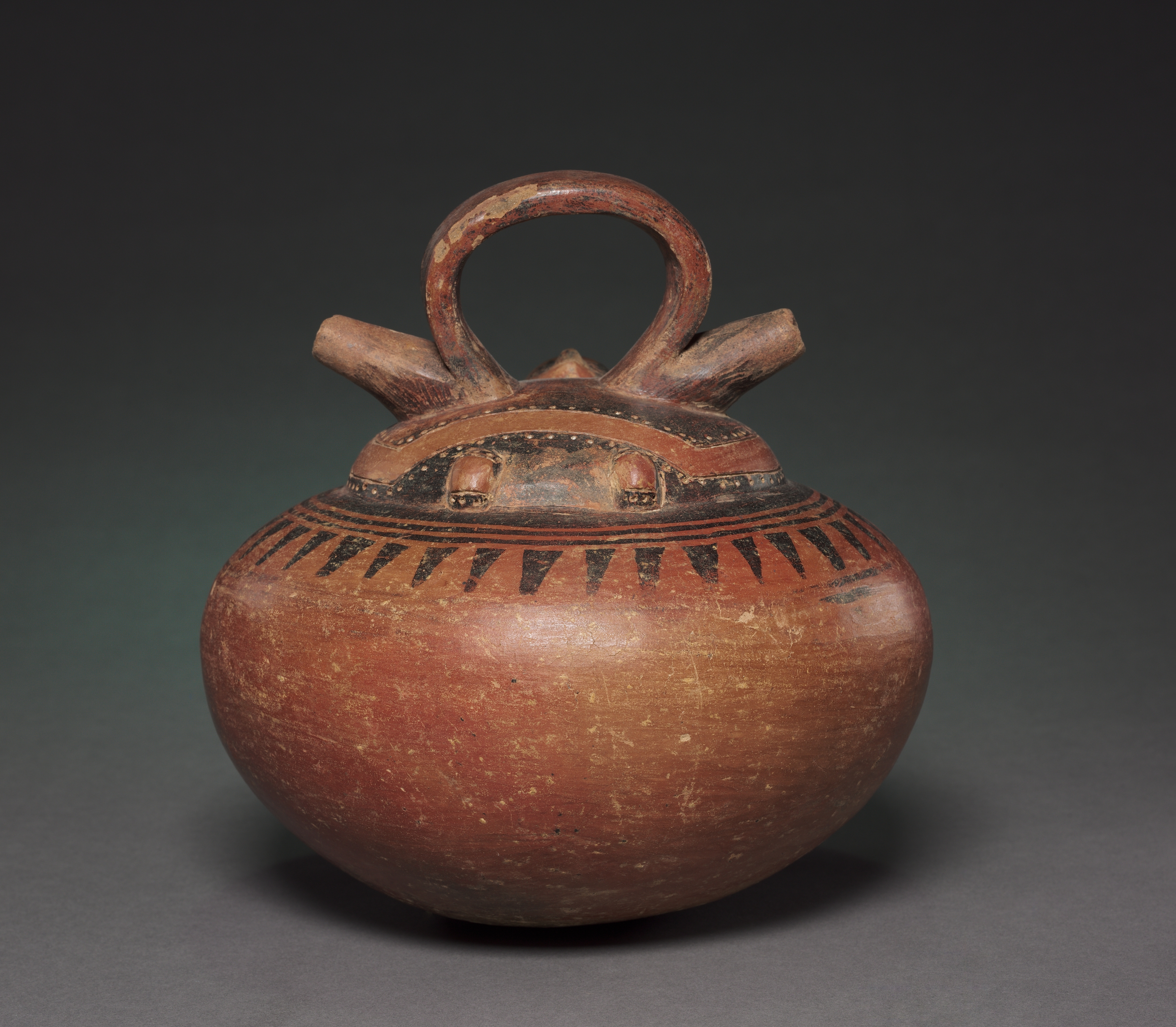 Double-Spouted Vessel with Reclining Figure