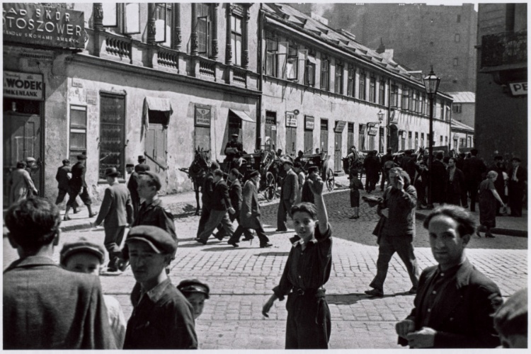 Crowded street in a Jewish district of Warsaw on the Sabbath, when all the stores are closed