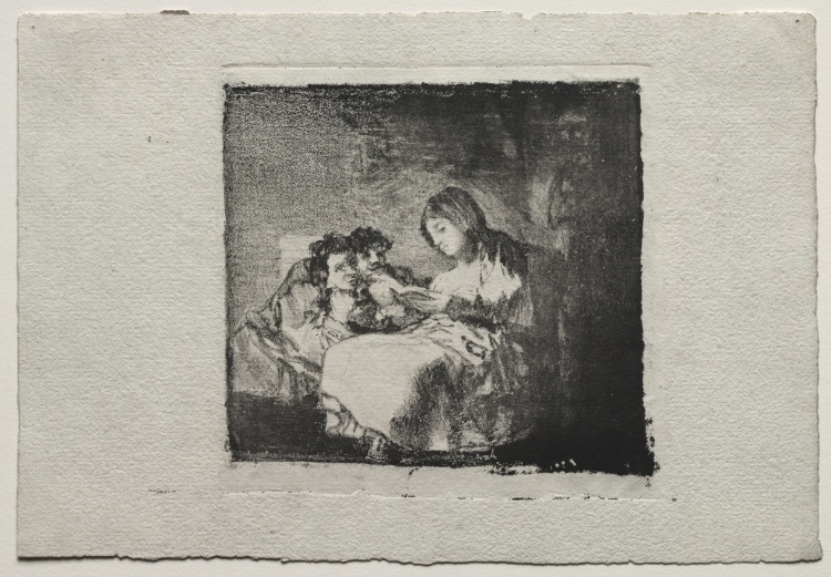 Woman Reading to Two Children