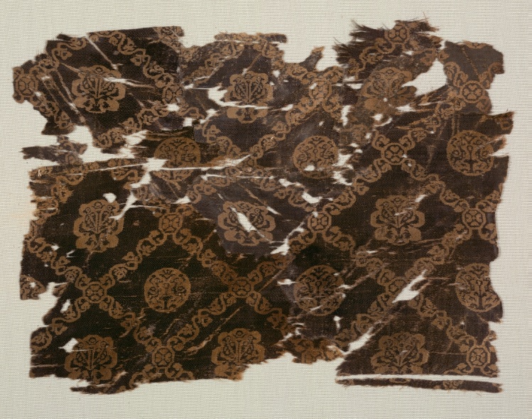 Silk with lattice of animals in medallions