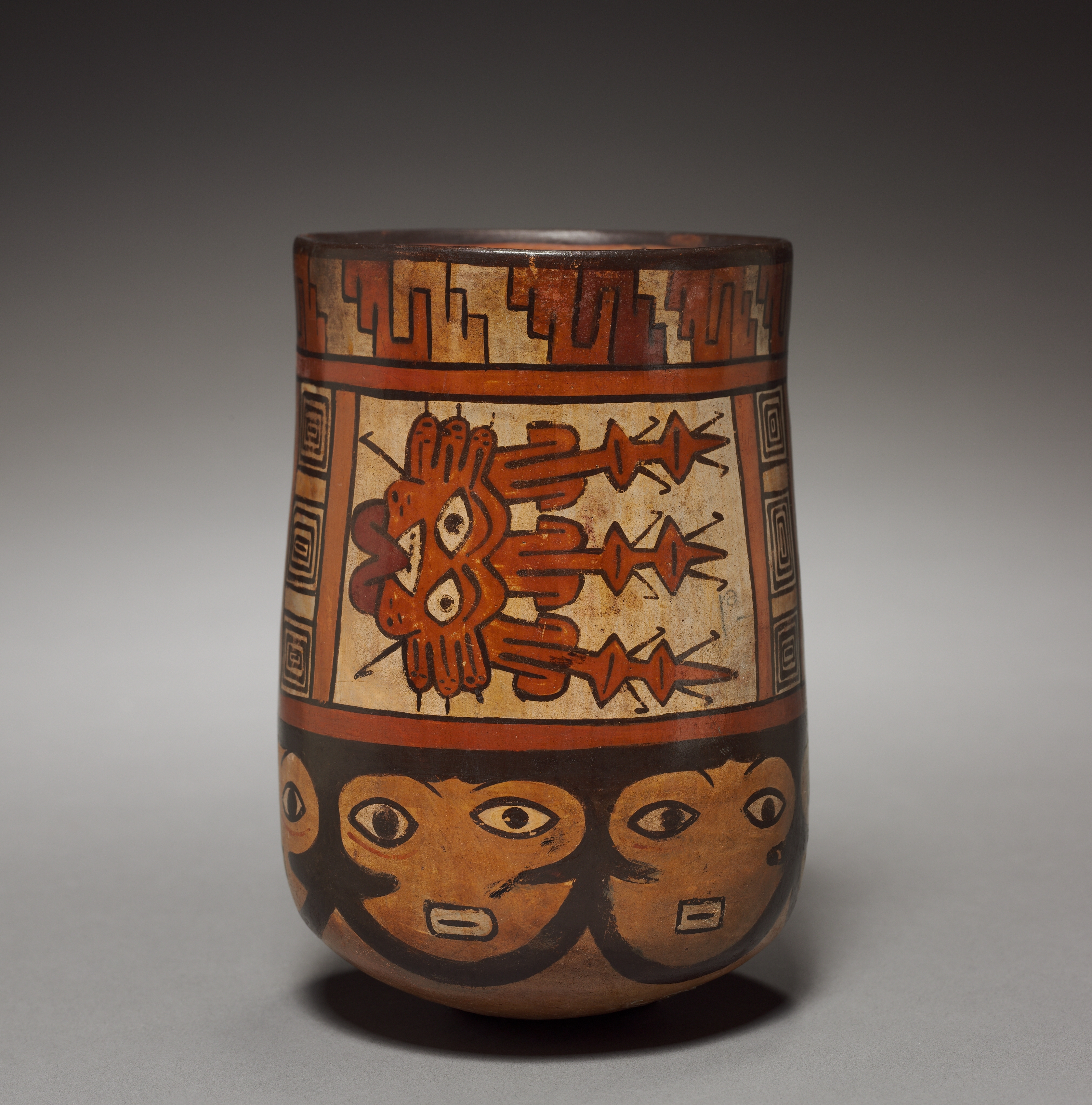 Vessel with Female Faces