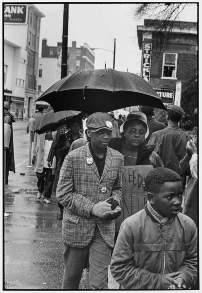 Fanny Lou Hamer, sharecropper from a family of twenty children, evicted from her home for applying to register to vote, severely beaten in the Winona police station, SNCC field secretary from Ruleville, and future Mississippi Freedom Democratic party candidate for Congress, marches in the cold Hattiesburg rain