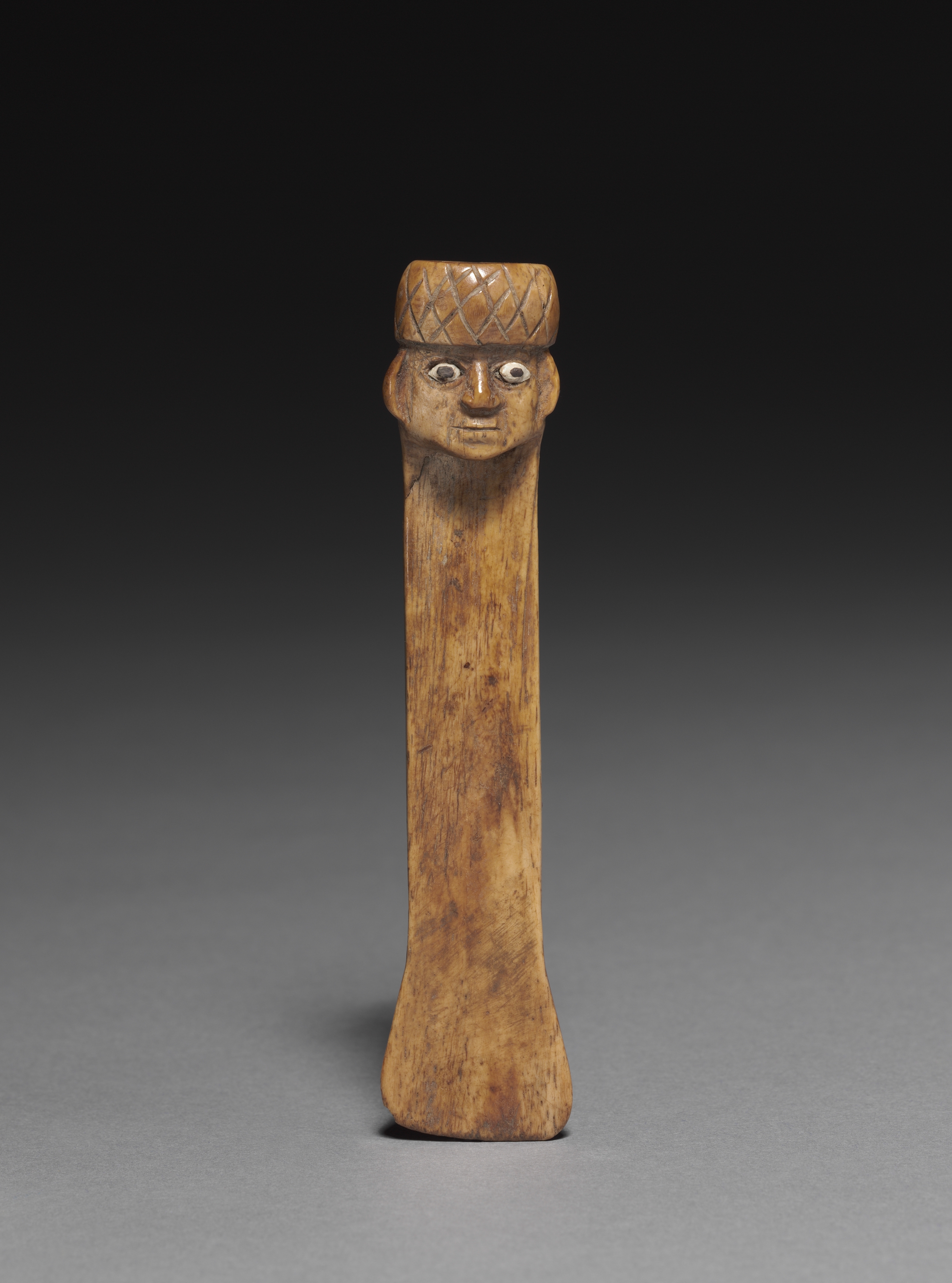 Spatula with Carved Head