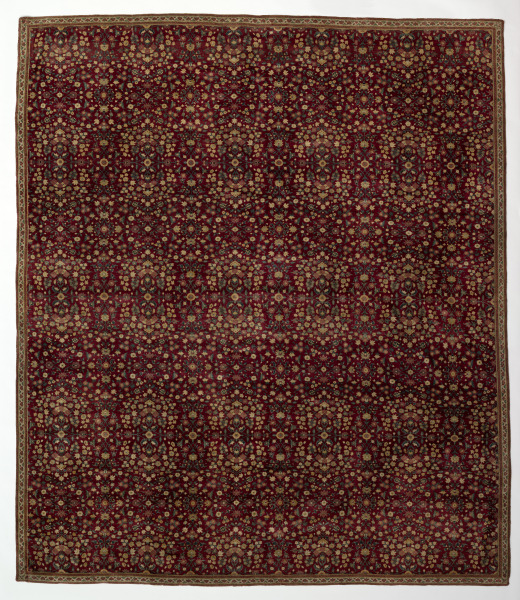 Woolen carpet with millefleurs decoration
