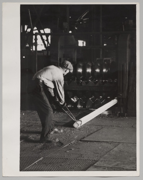 Man Pulling a Steel Ingot