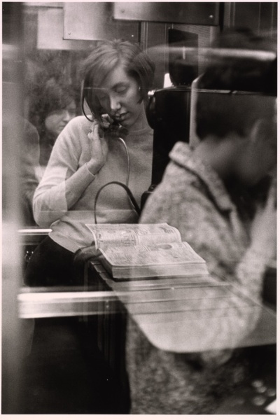 Woman in phone booth