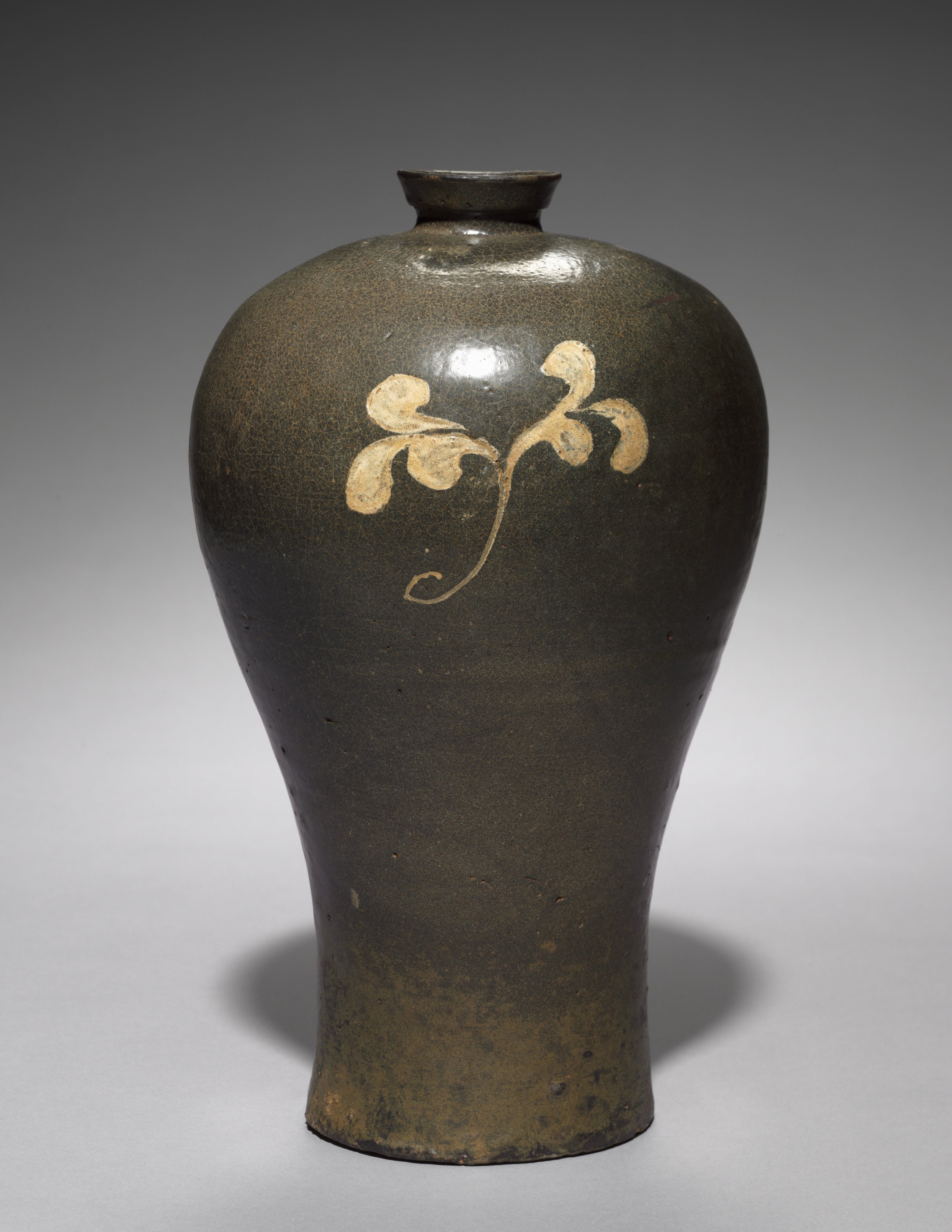 Iron-glazed Prunus Vase with Inlaid Floral Design