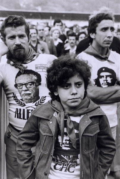 Wearing a variety of t-shirts with portraits of Che Guevara and Salvador Allende, these young communists participate in a party rally in Oviedo, Northern Spain. It was the last weekend for the five major political parties during their electoral campaign prior to the nation's voting on the 15th of June. Throughout the country in football fields and bullrings, in town halls and cinemas, the various leaders made their last efforts for the country's first free election in 41 years. The latest polls show that Prime Minister Adolfo Suarez's party, the "Democratic Center Union," emerges as perhaps the strongest group, but without a working majority, they may be forced to form a coalition with the Socialists