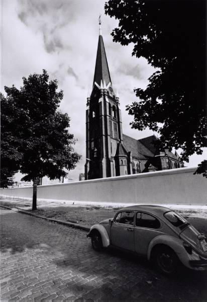 Car on a Street in Front of a Church and the Berlin Wall
