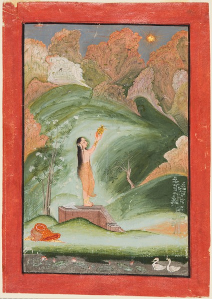 A girl worshipping the rising sun (Surya puja)