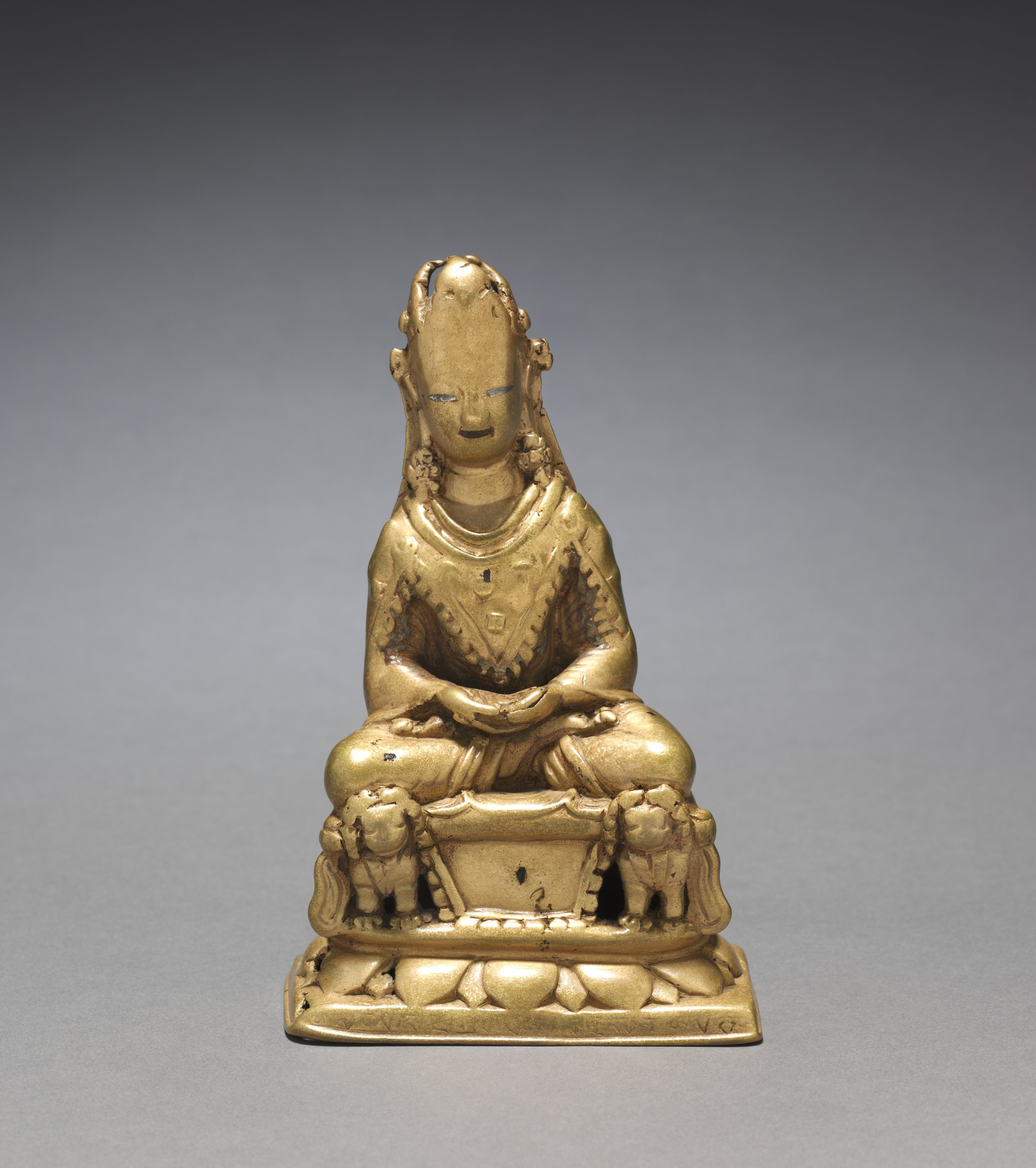 Crowned Buddha Seated on a Lion Throne