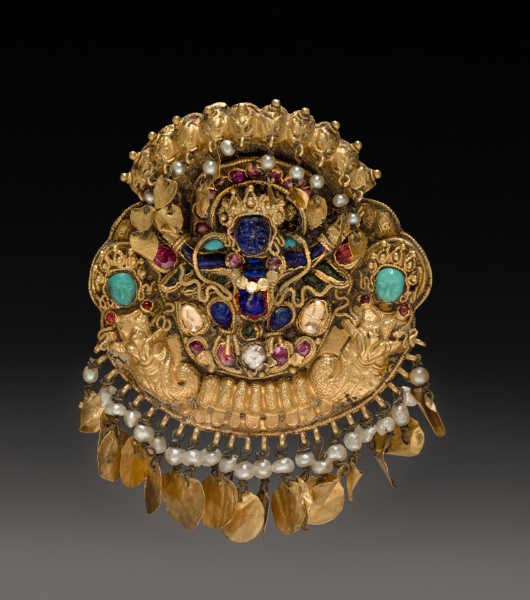 Pendant with Two-Armed Blue Deity on a Lotus with Nagas (serpent divinities)