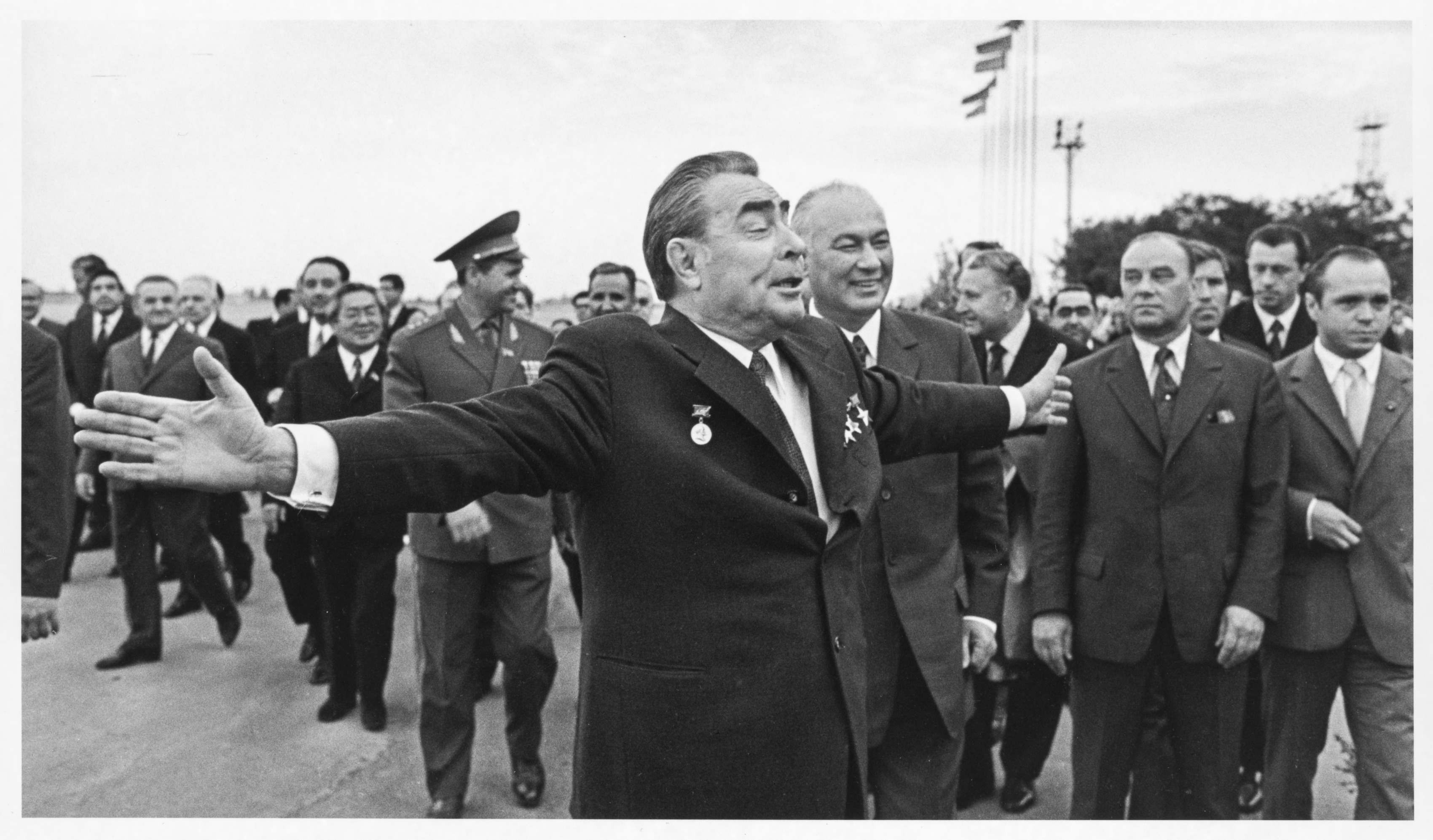 "A Wide Soul" Brezhnev greets well-wishers at the Tashkent airport, with Reashidov to his left, Uzbekistan
