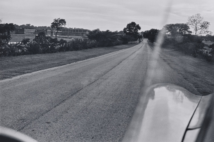 Untitled (road to prison from inside car)