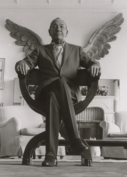 English Playwright Sir Noël Coward Seated in Chair with Wings, Les Avants, Montreux, Suisse