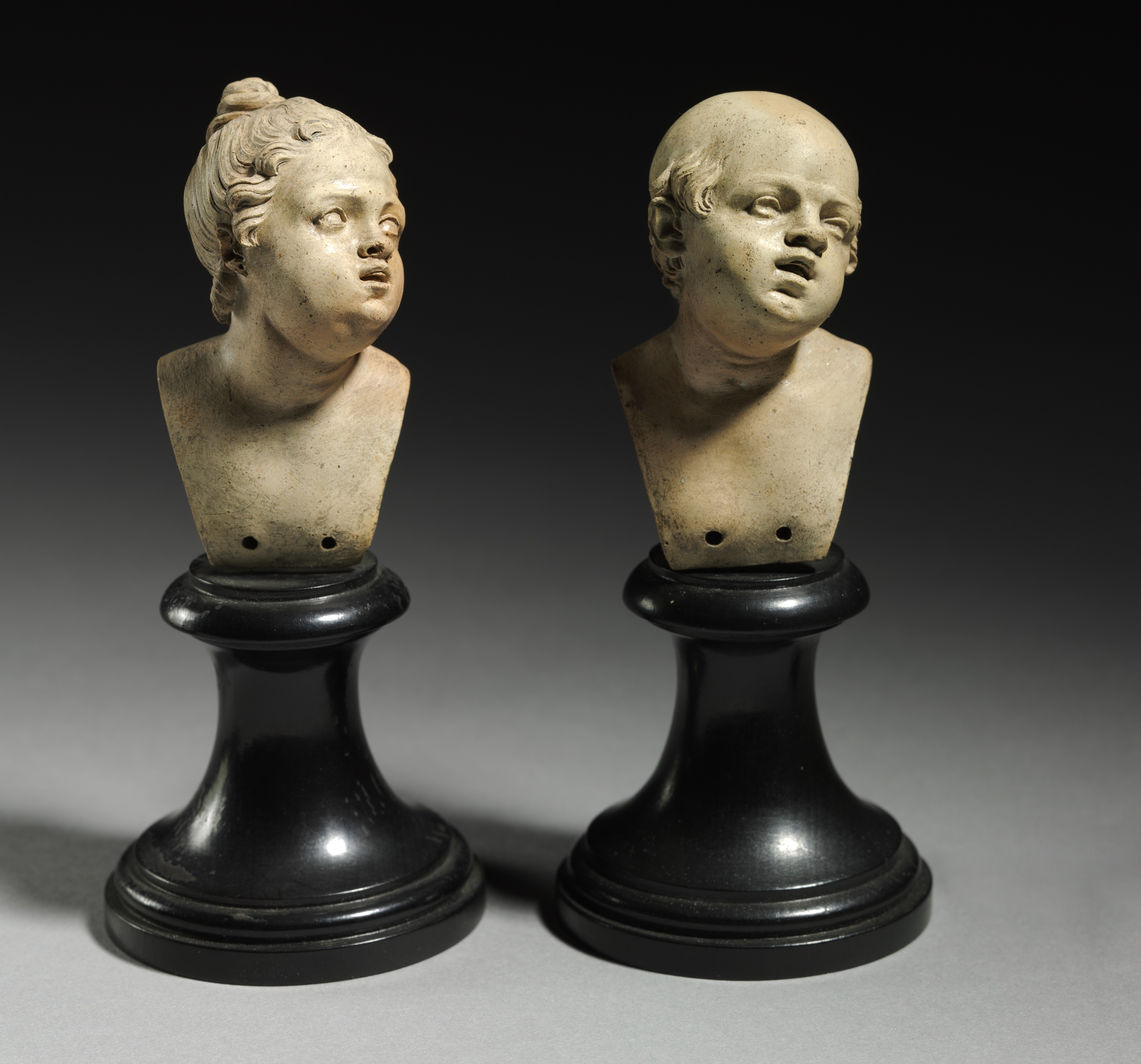 Bust Pair: Head of a Man and Head of a Woman