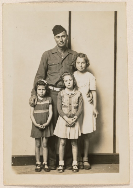Louie Ramer with his daughters Avonelle, Lucille, and Faye, striped background