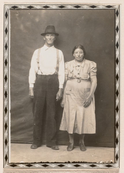 Standing middle-aged couple, diamond border