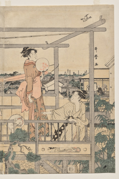 Women Hanging Laundry to Dry on a Balcony