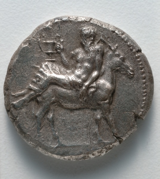 Tetradrachm: Dionysos with Kantharos on Donkey (obverse)
