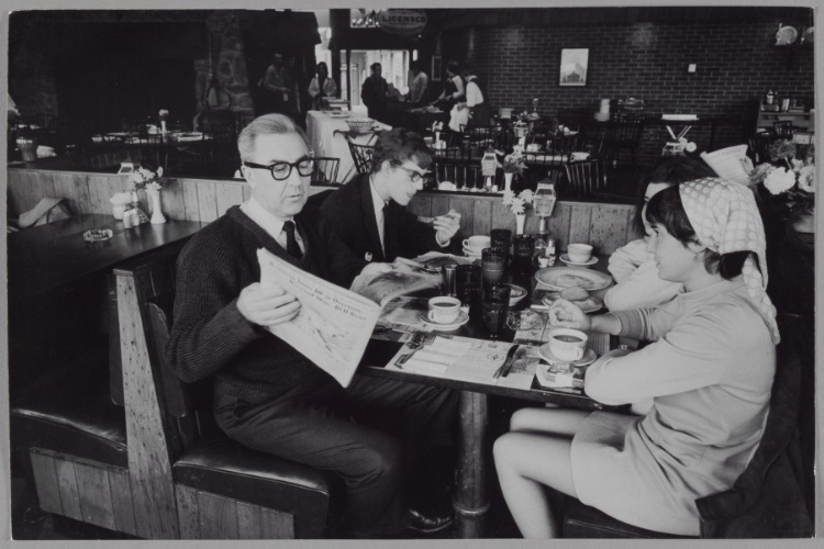 Eugene McCarthy Reading a Newspaper at a Restaurant During Presidential Campaign