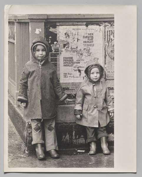 Untitled (Two Girls in Front of Posters in Front of a New York Subway Station)