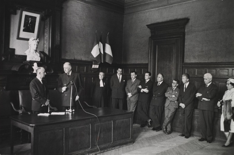 President Charles De Gaulle in the Decazeville town hall with the mayor and the municipal council, September