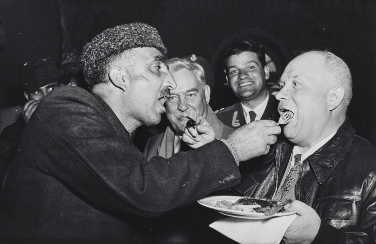 The Politics of Dinner, Afghanistan 1955 (Khrushchev exchanges food with the Afghan P.M. while Bulganin looks on)