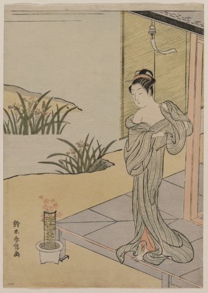 Young Woman Looking at a Pot of Pinks