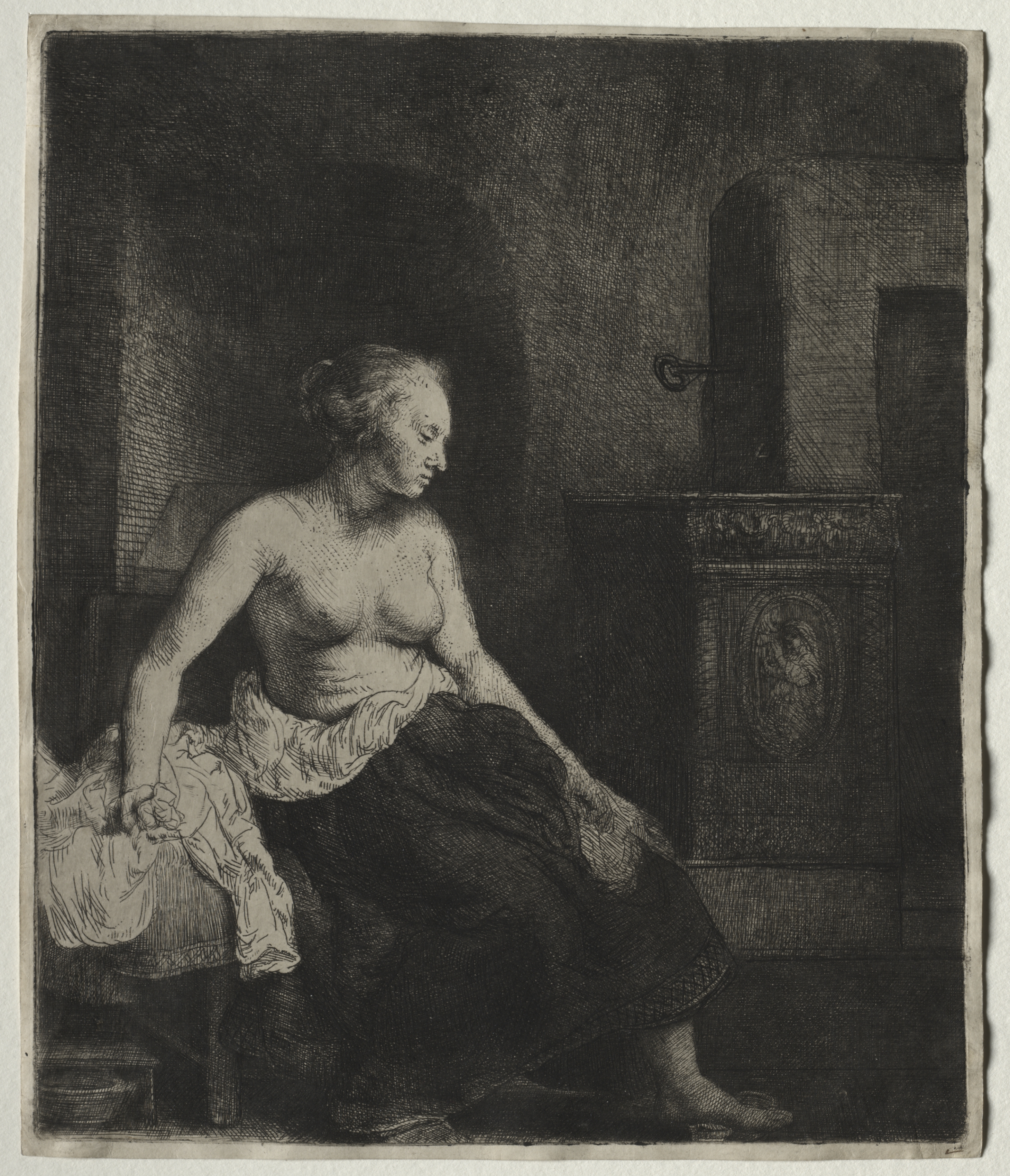 Woman Sitting Half Dressed Beside a Stove