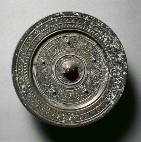 Mirror with Concentric Circles, an Immortal, and Auspicious Animals