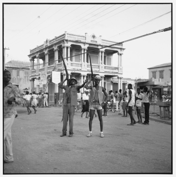 Two youths imitate the Tontons Macoute during Mardi Gras, Gonaïves