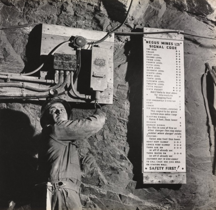 E.C. Rudd, Assistant Manager, Negus Gold Mines, Signaling for a Lift, Yellowknife, Northwest Territories, Canada