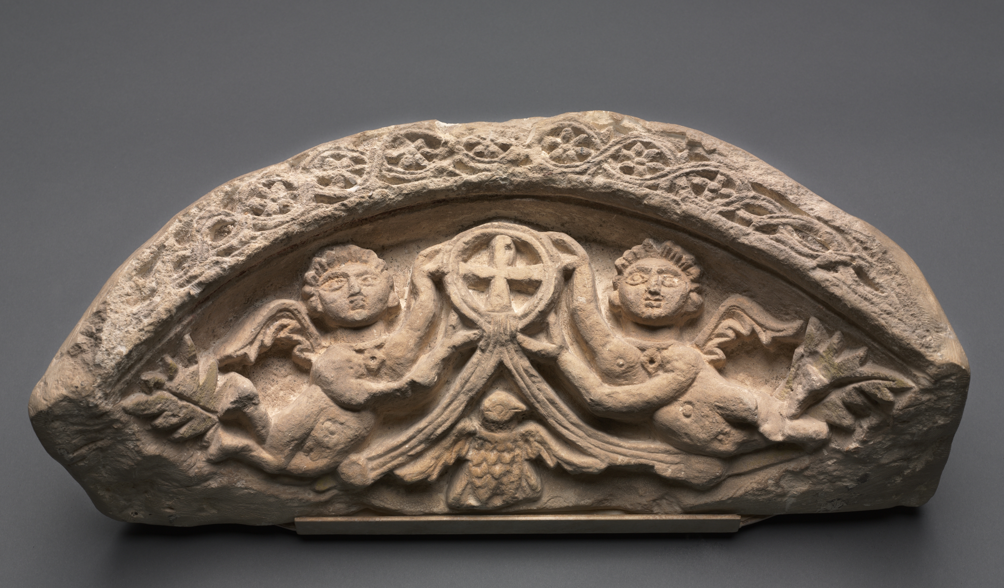 Lunette with Two Angels Supporting a Pendant Cross