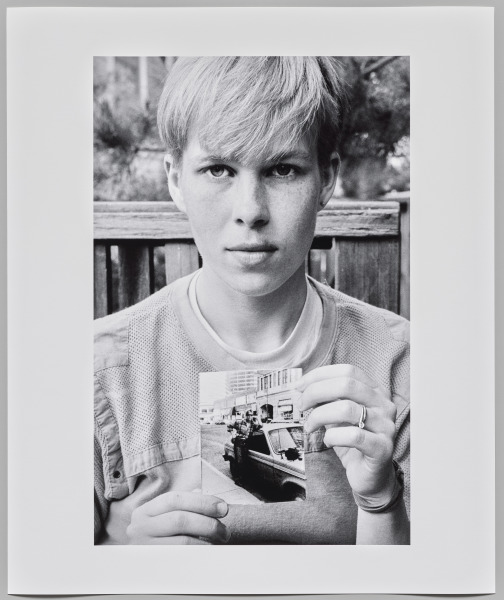 Pam with a portrait of abuser, battered lesbian, Boulder, Co