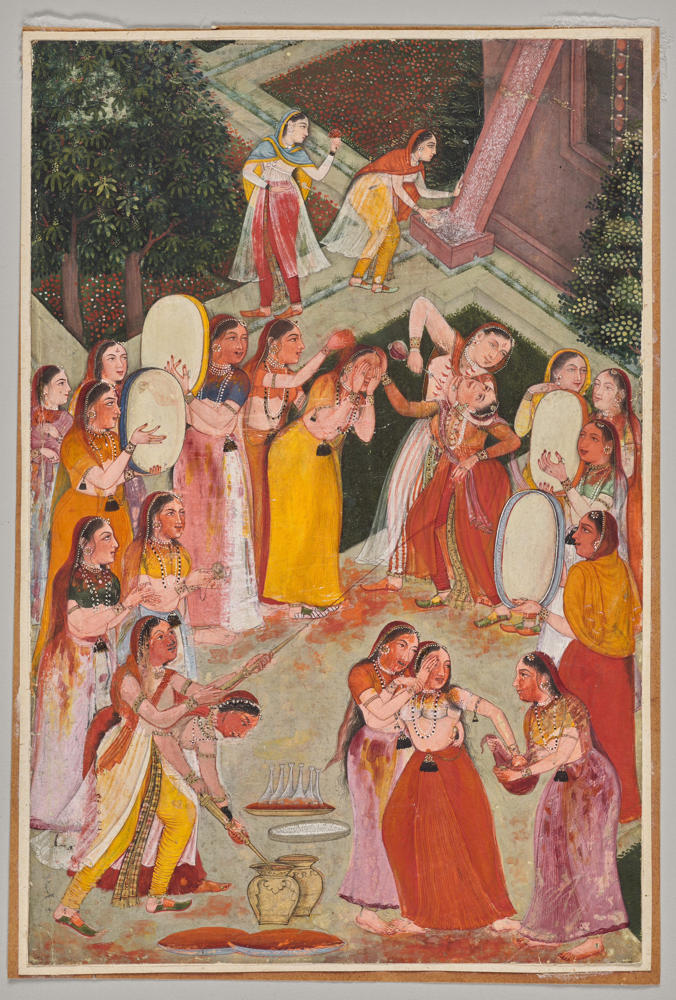 Girls Spraying Each Other at Holi