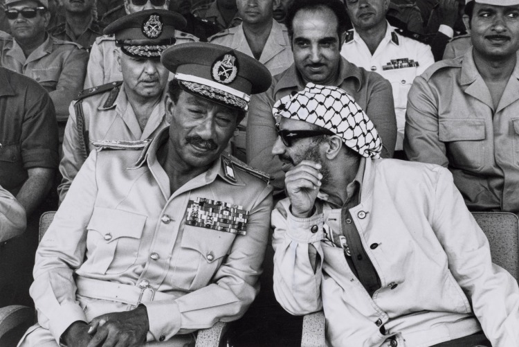 Sadat Reopens the Suez Canal: Egyptian President Anwar El Sadat and Guerilla Leader Yasser Arafat Reviewing the Egyptian Army Units, Egypt
