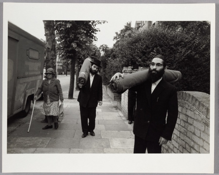 Hassidic Businessmen Carry Cloth, London, England