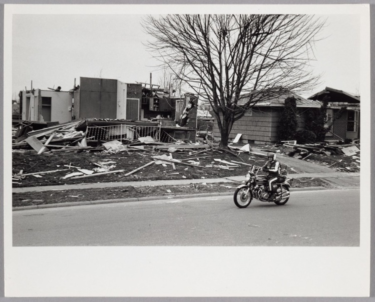 Motorcycle Parked in Front of Tornado-Damaged Home, Xenia, OH, USA
