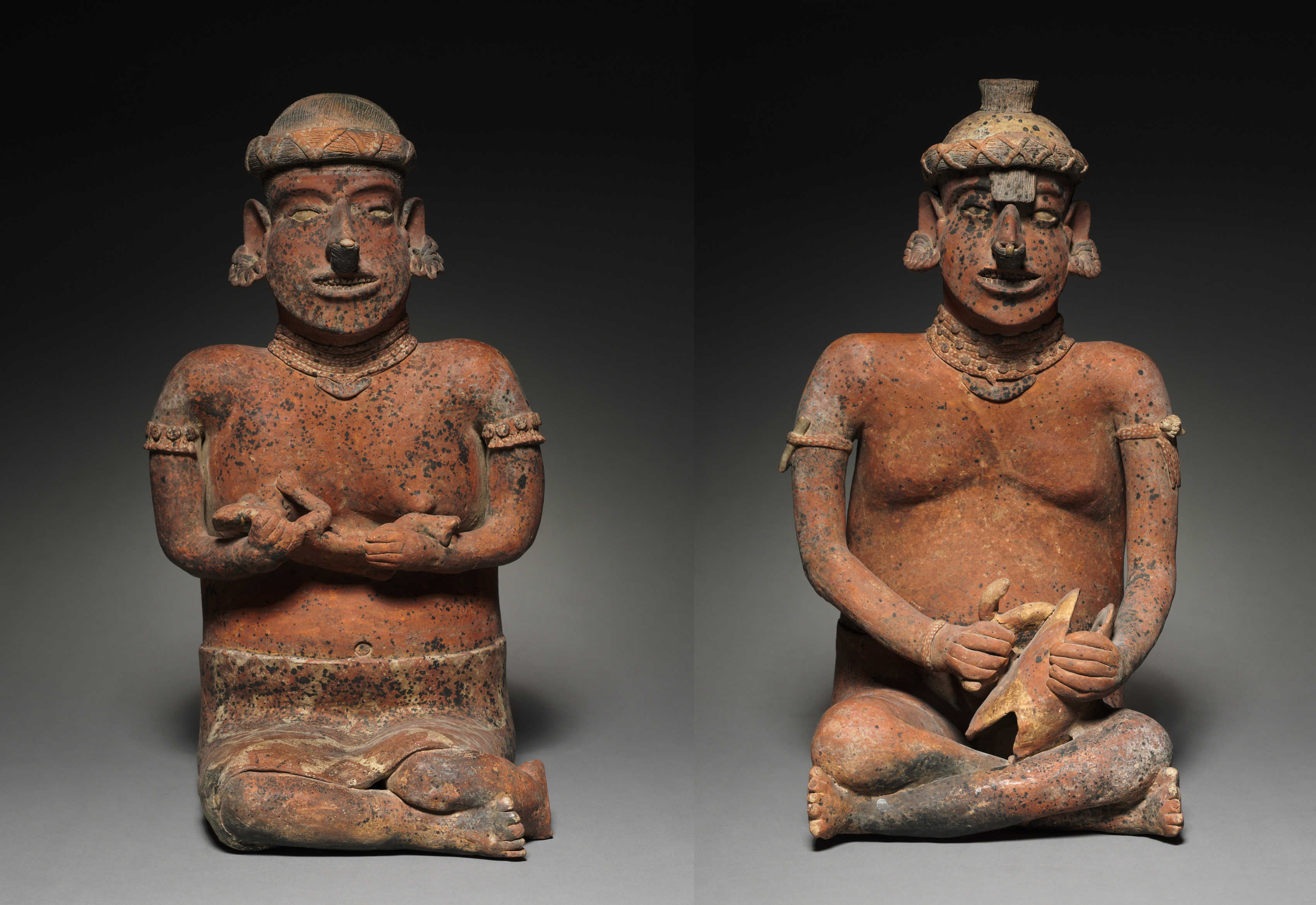 Pair of Seated Figures