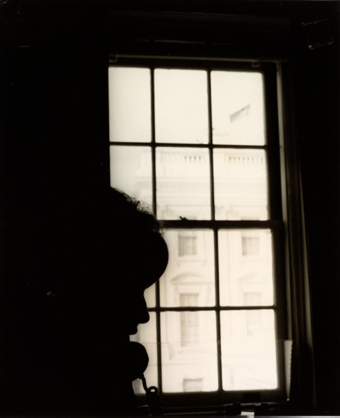 Silhouette of Press Secretary to the First Lady Pam Turnure on the telephone