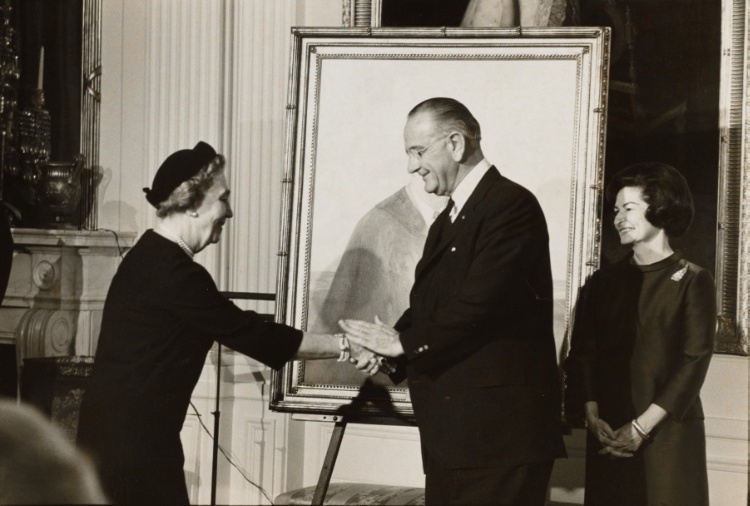President Lyndon Johnson shaking hands with Elizabeth Shoumatoff at the unveiling of her portrait of the late President Franklin Roosevelt at the White House