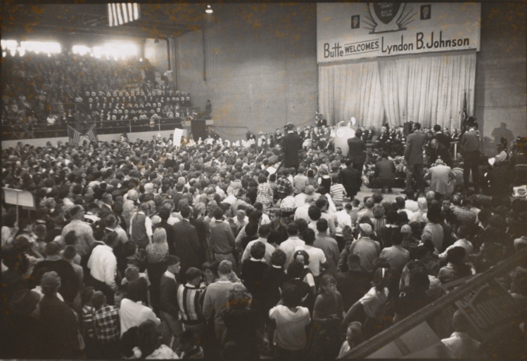 LBJ speaking in a crowded auditorium in Butte, Montana