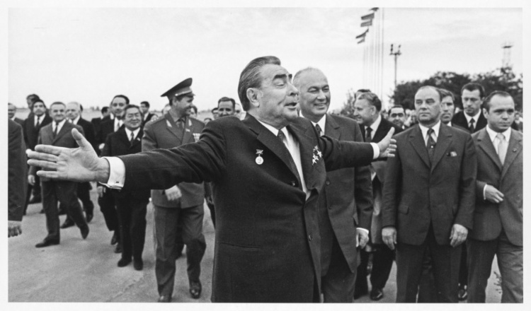 "A Wide Soul" Brezhnev greets well-wishers at the Tashkent airport, with Reashidov to his left, Uzbekistan