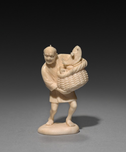 Man Carrying a Basket of Fish