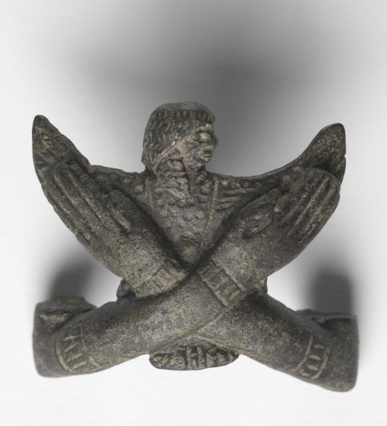 Bronze mount from a "Shawabty Bundle": Crossed Arms
