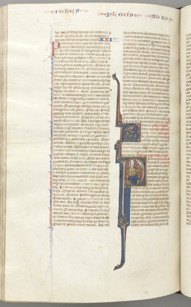 Fol. 435v, Romans, historiated initial P, Paul seated with a sword talking to the bust of God above