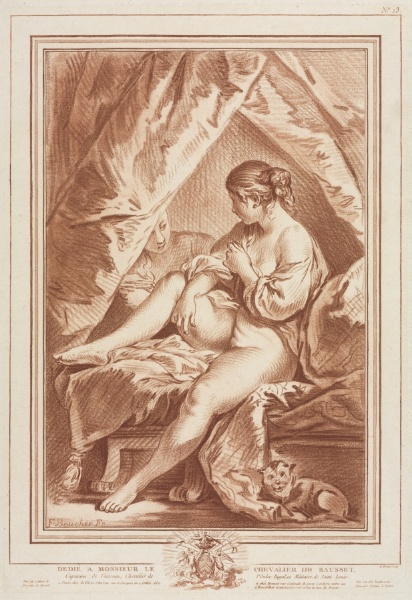 Young Woman Seated on a Bed
